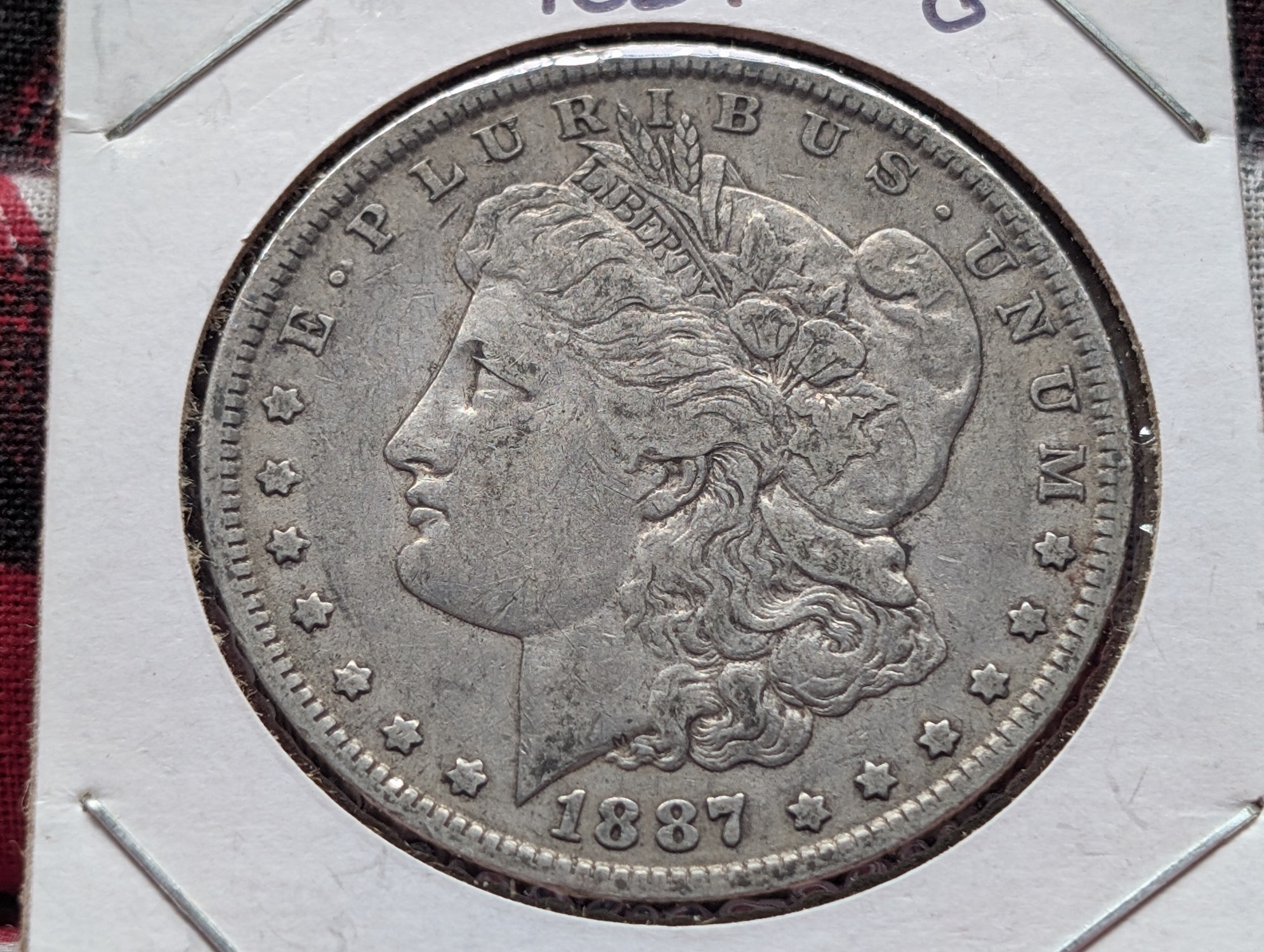 1887-O 90% Silver Morgan Dollar