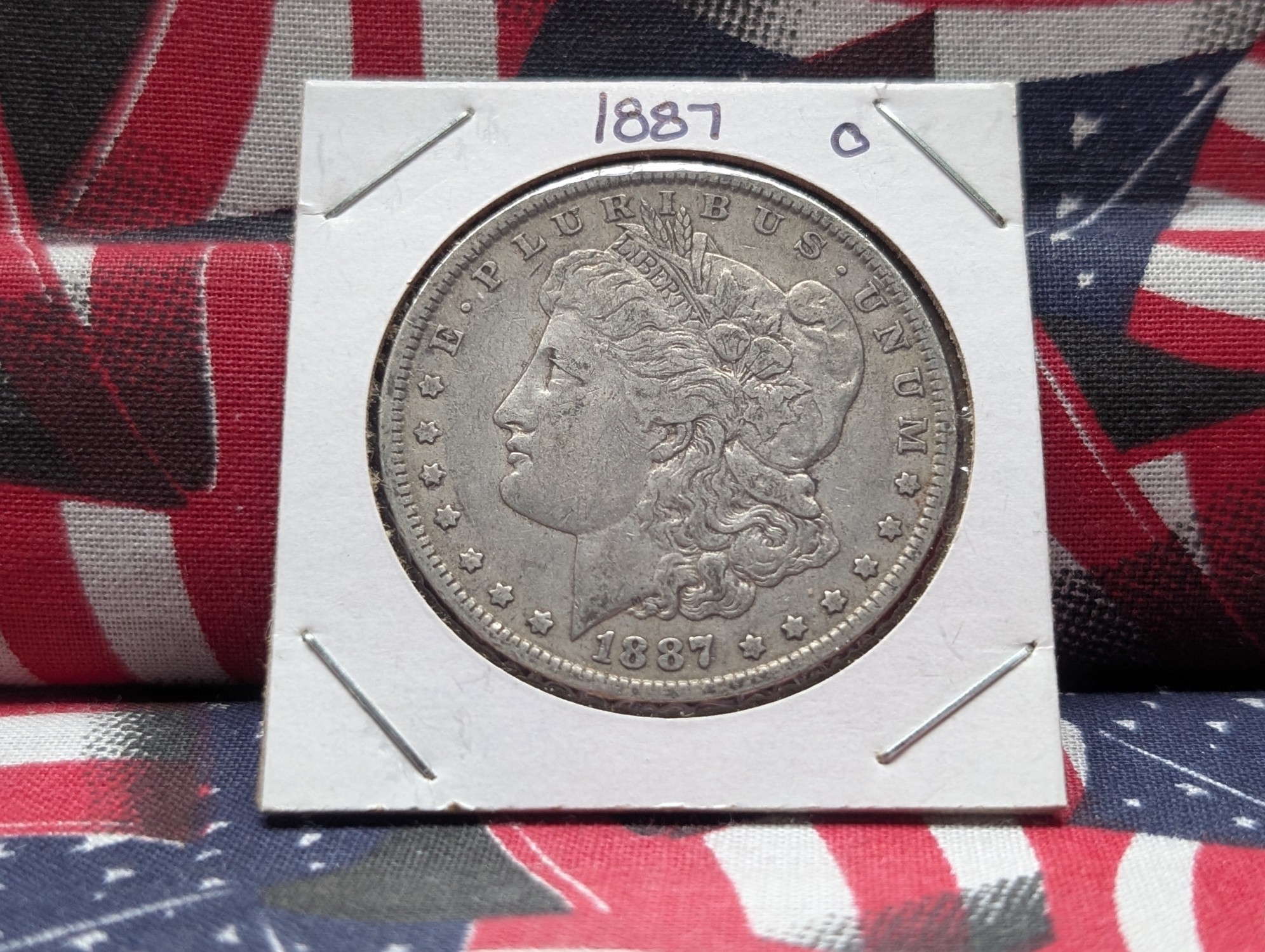 1887-O 90% Silver Morgan Dollar