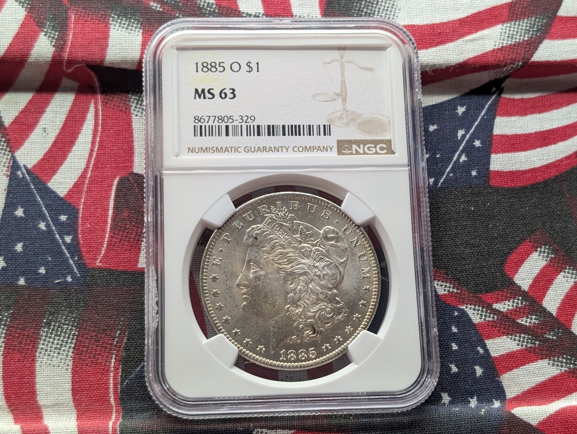 1885-O Morgan 90% Silver Dollar - NGC MS63