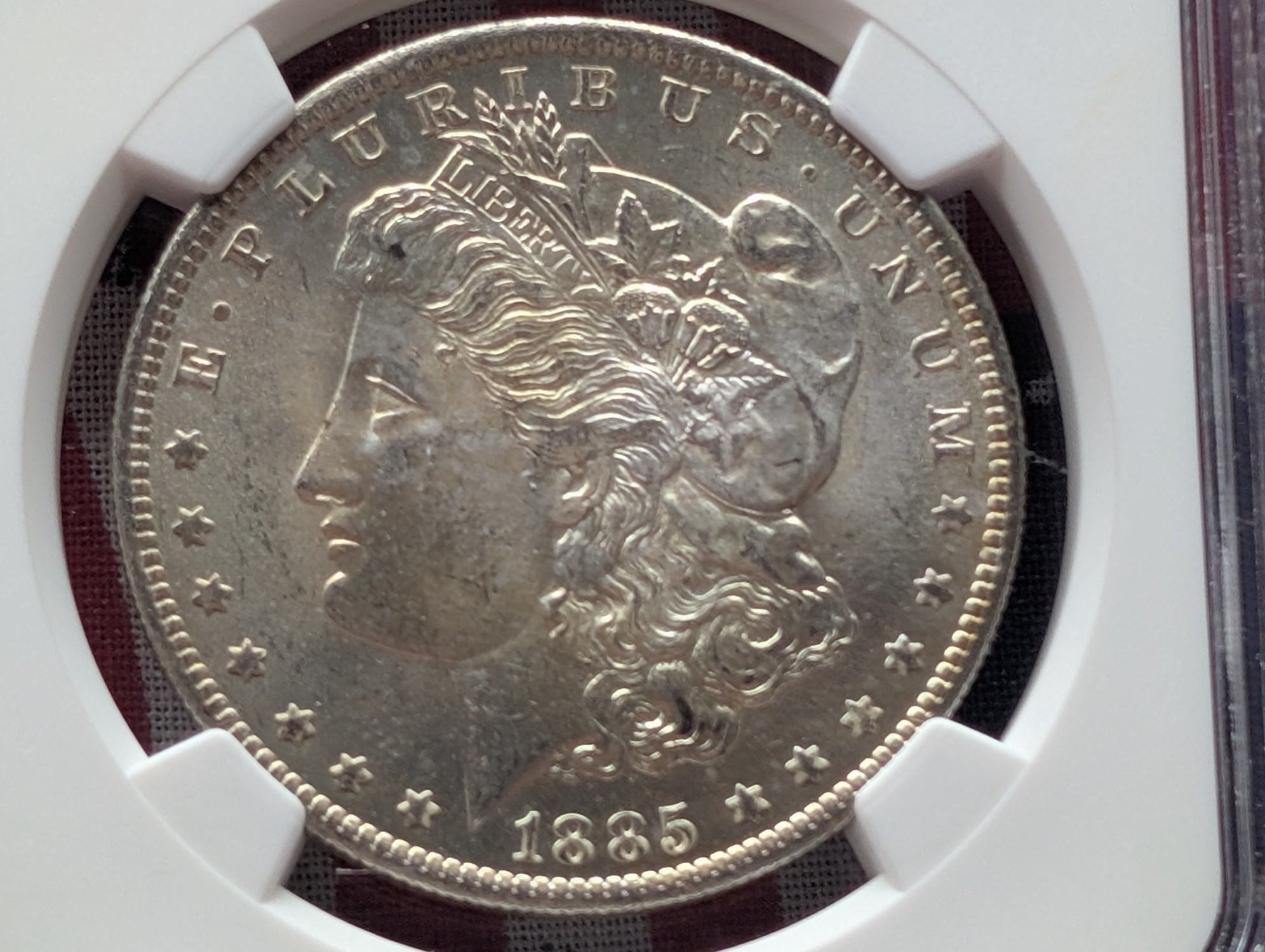 1885-O Morgan 90% Silver Dollar - NGC MS63