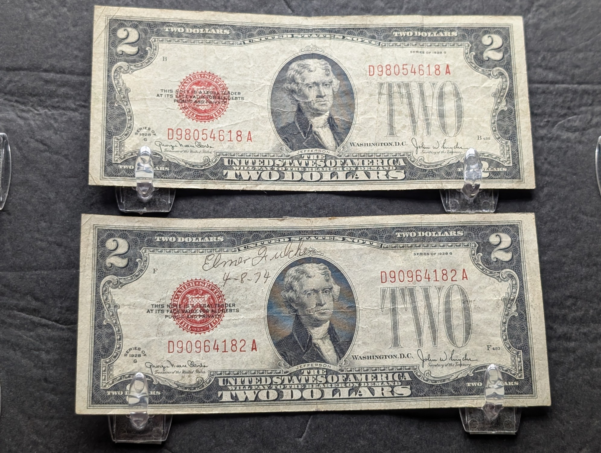 (2) 1928 G Series $2 RED SEAL Banknotes