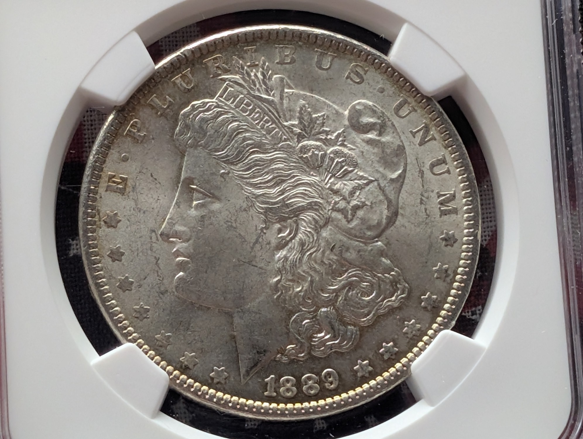 1889 Morgan 90% Silver Dollar - NGC MS63