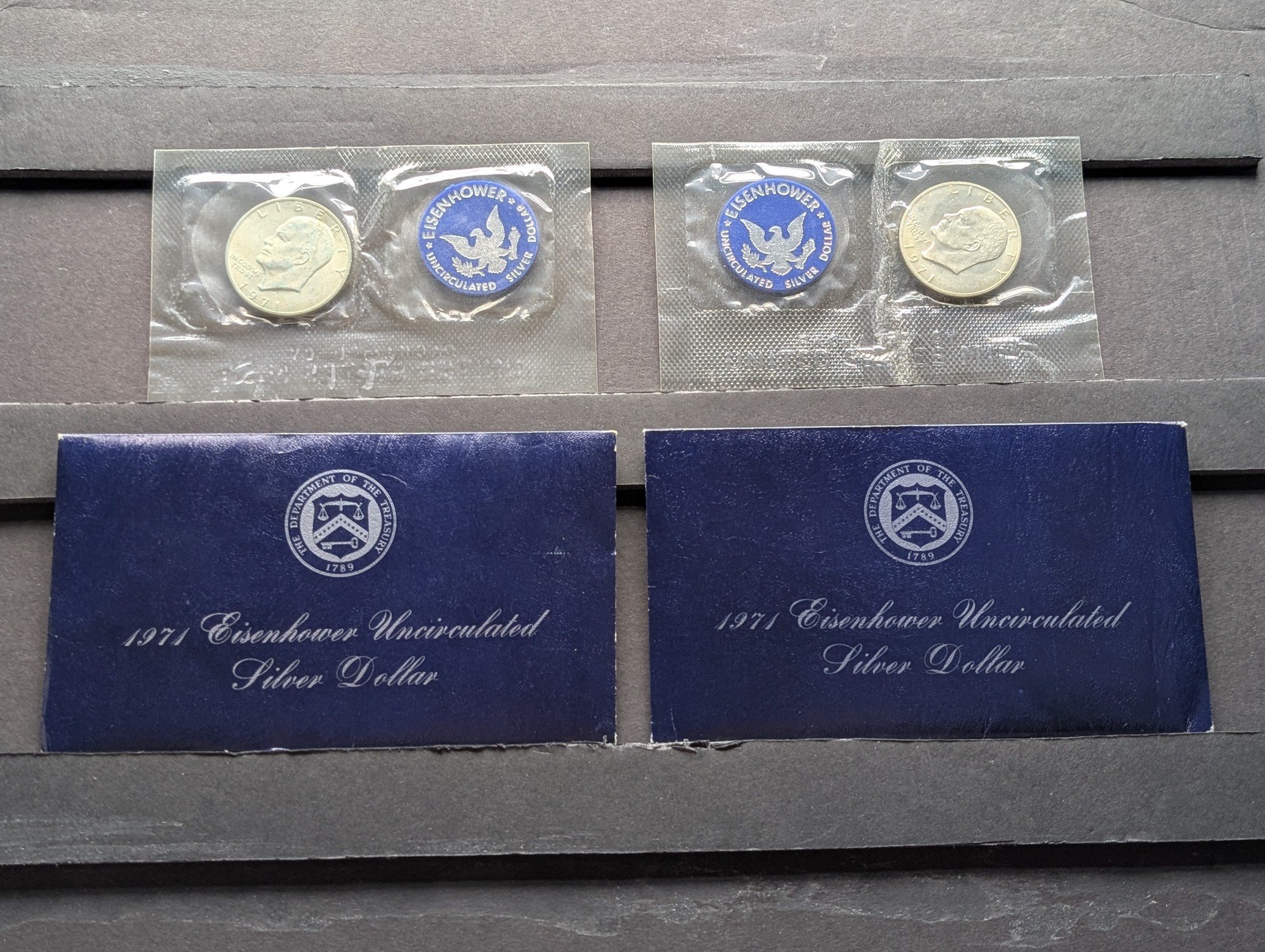 (2) 1971-S Eisenhower 40% Silver Uncirculated Blue Pack Dollars