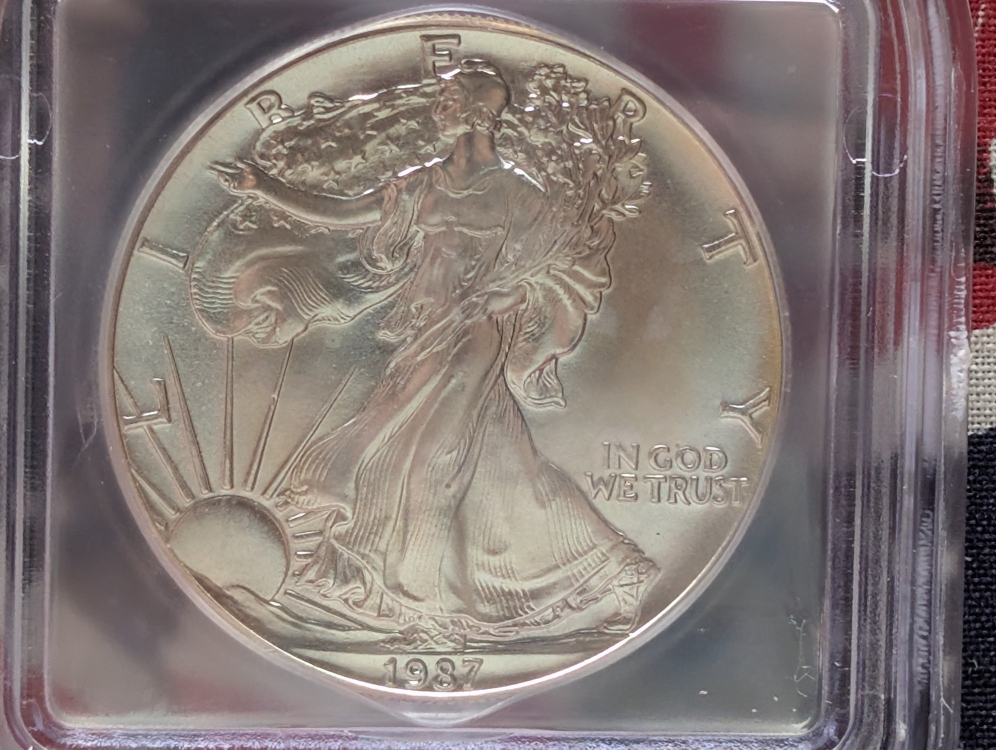 1987 American Silver Eagle 1 Troy Oz. .999 Fine Silver ICG MS69