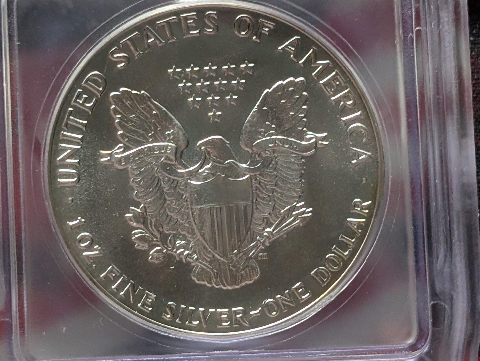 1987 American Silver Eagle 1 Troy Oz. .999 Fine Silver ICG MS69
