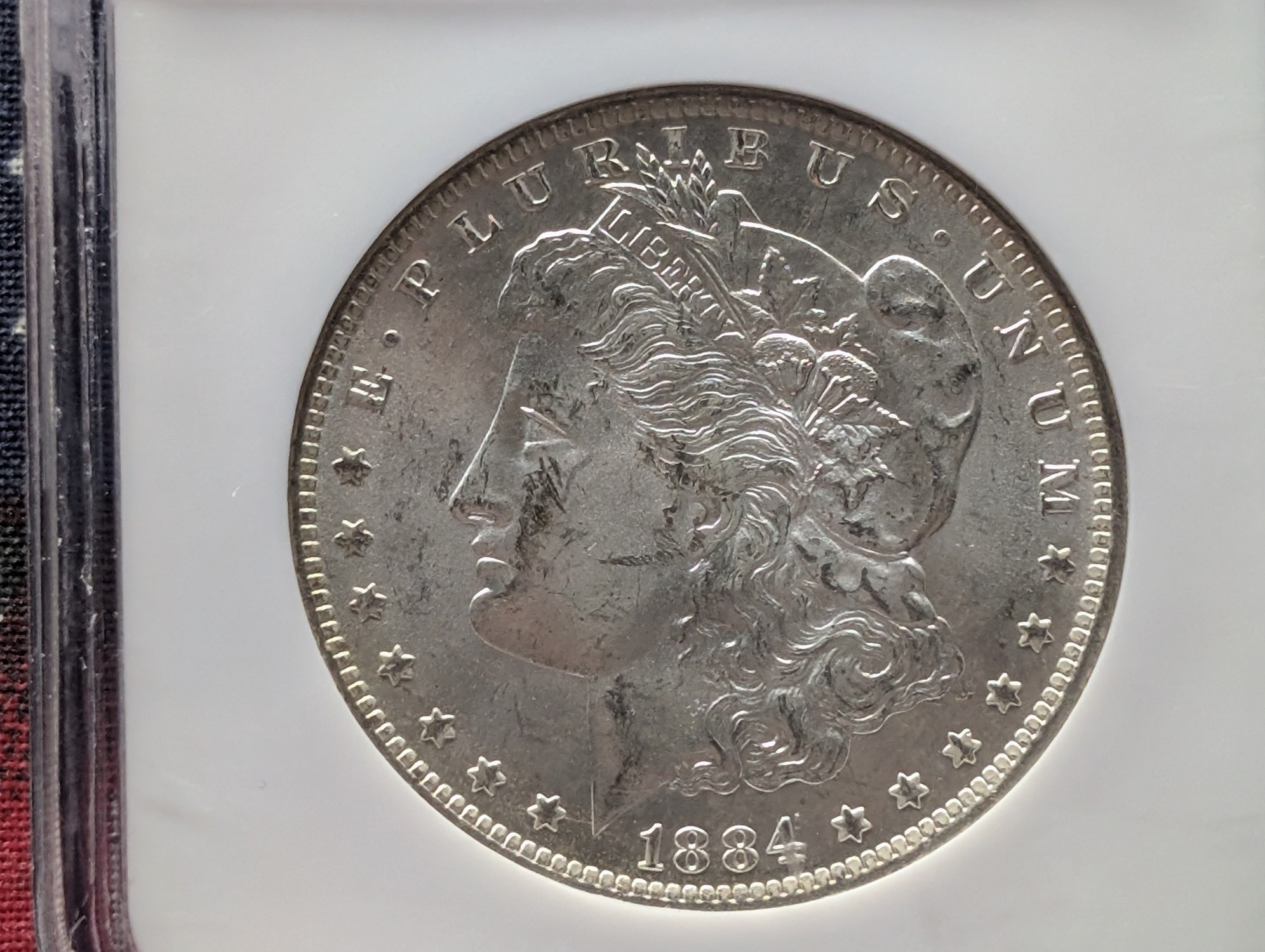 1884-O Morgan 90% Silver Dollar NGC MS63