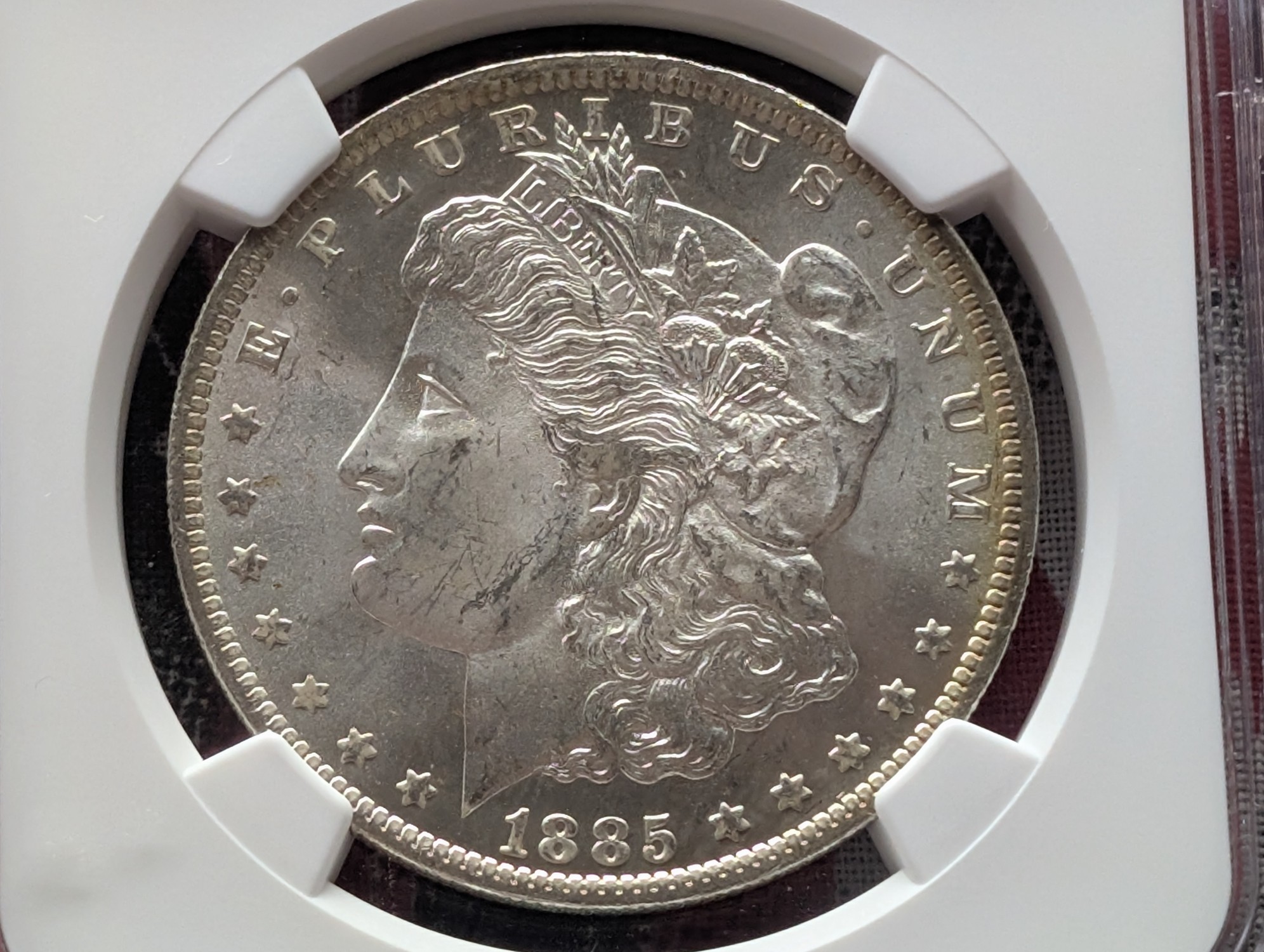 1885-O Morgan 90% Silver Dollar NGC MS64
