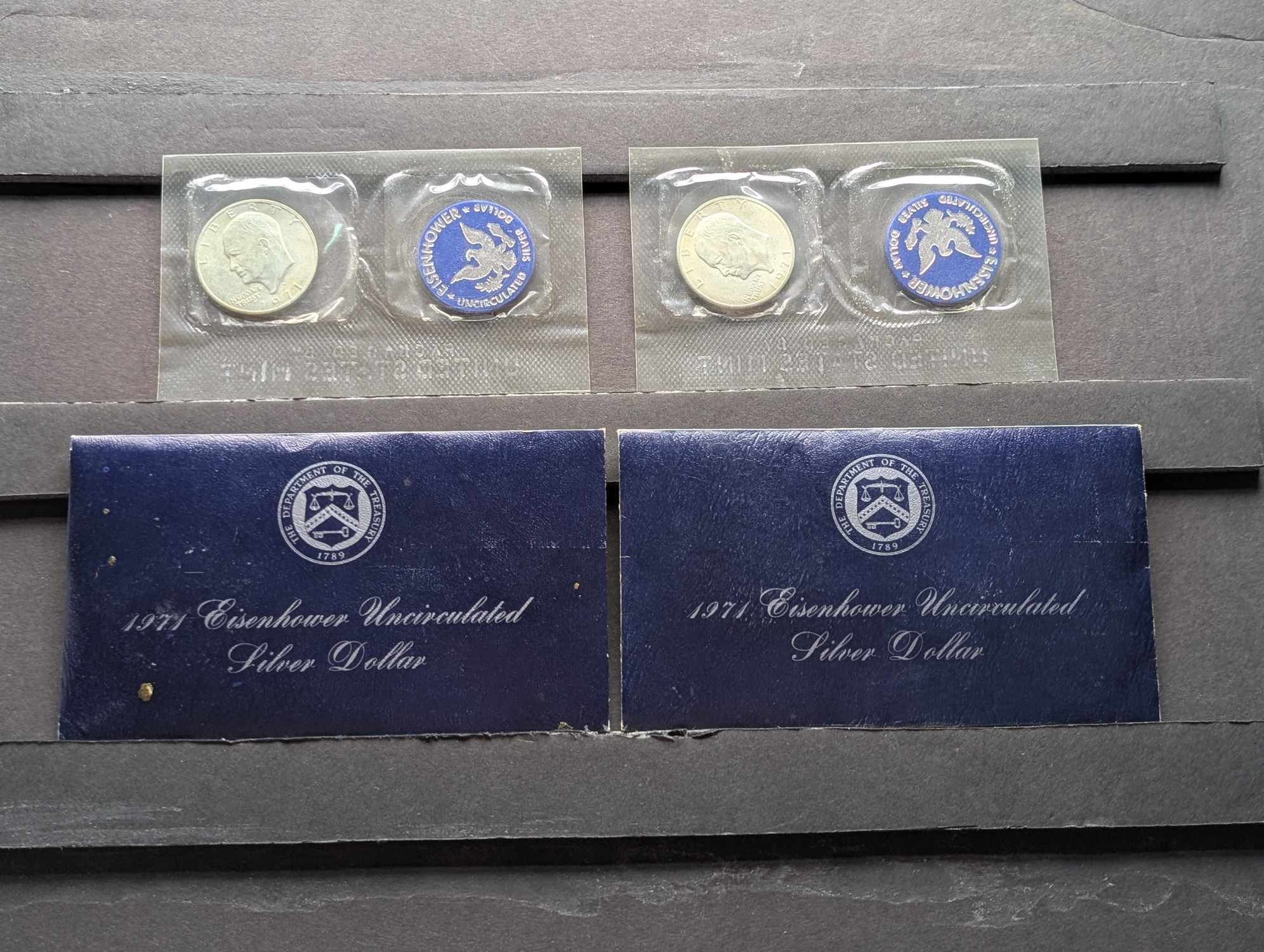 (2) 1971-S Eisenhower 40% Silver Uncirculated Blue Pack Dollars