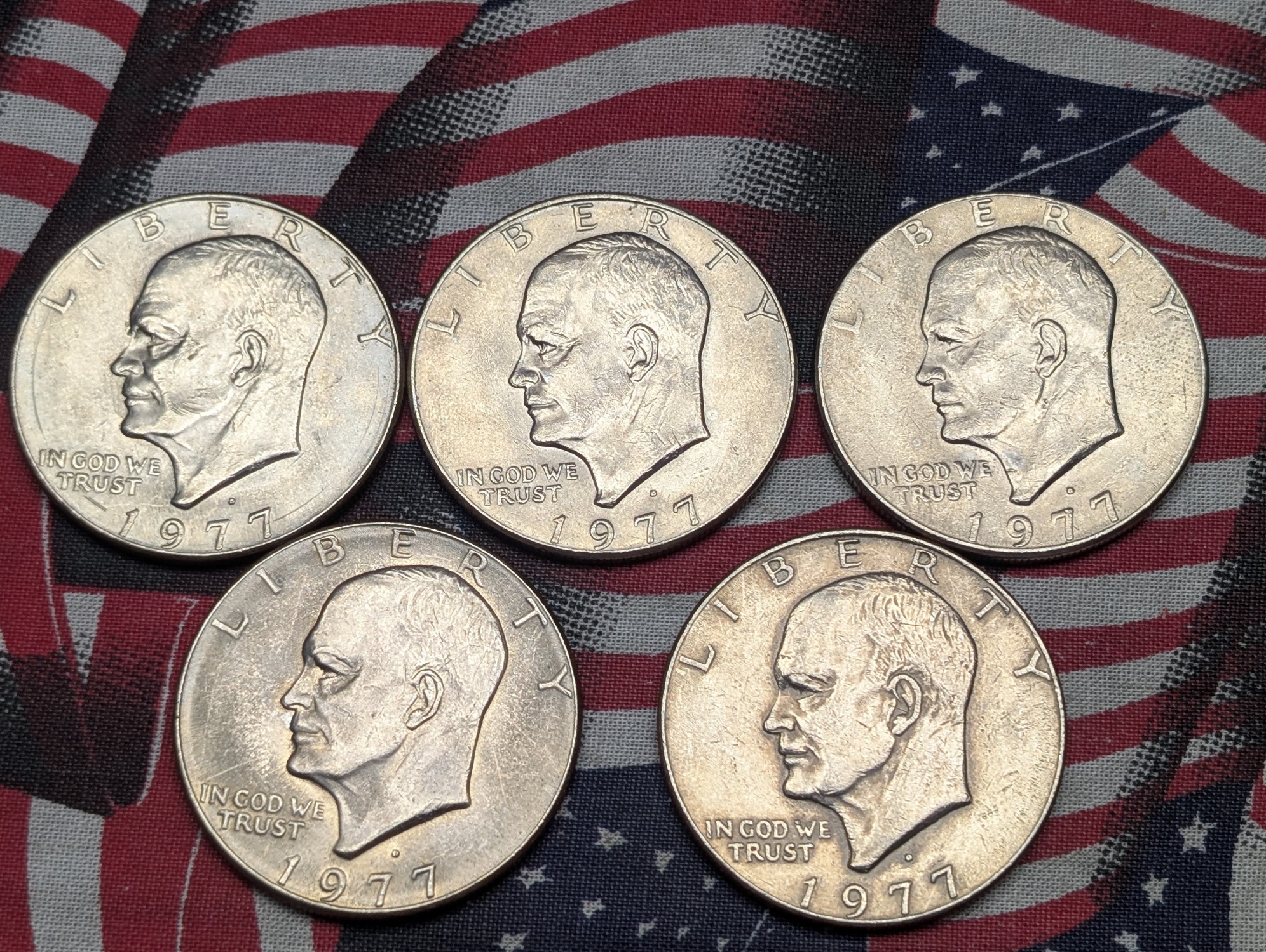 (5) 1977-D Eisenhower Dollars