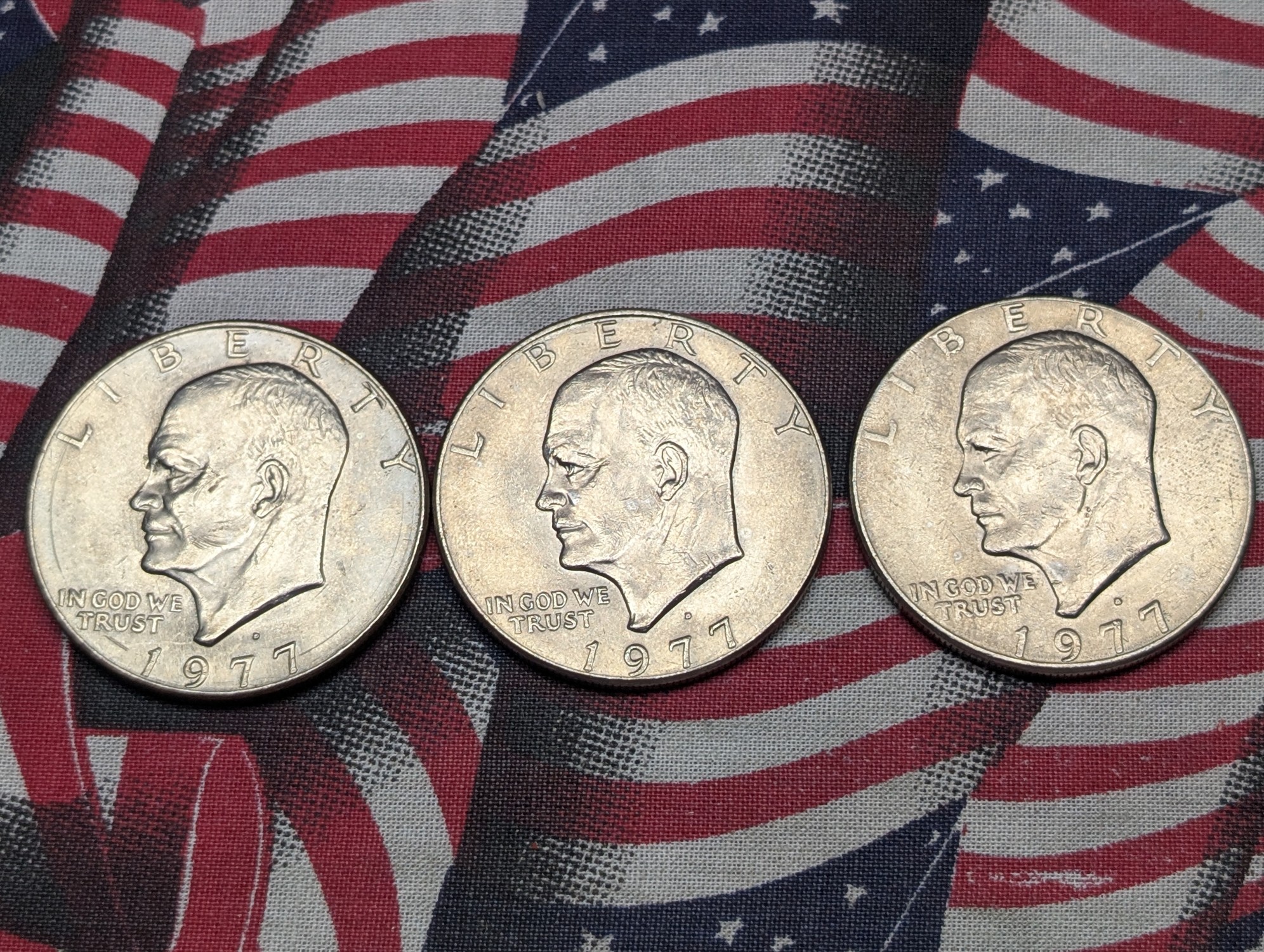 (5) 1977-D Eisenhower Dollars