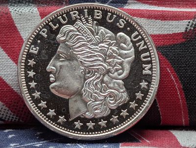 One Troy Oz. .999 Fine Silver Morgan Head Design Round Condition PLEASE NOTE Some coins may 