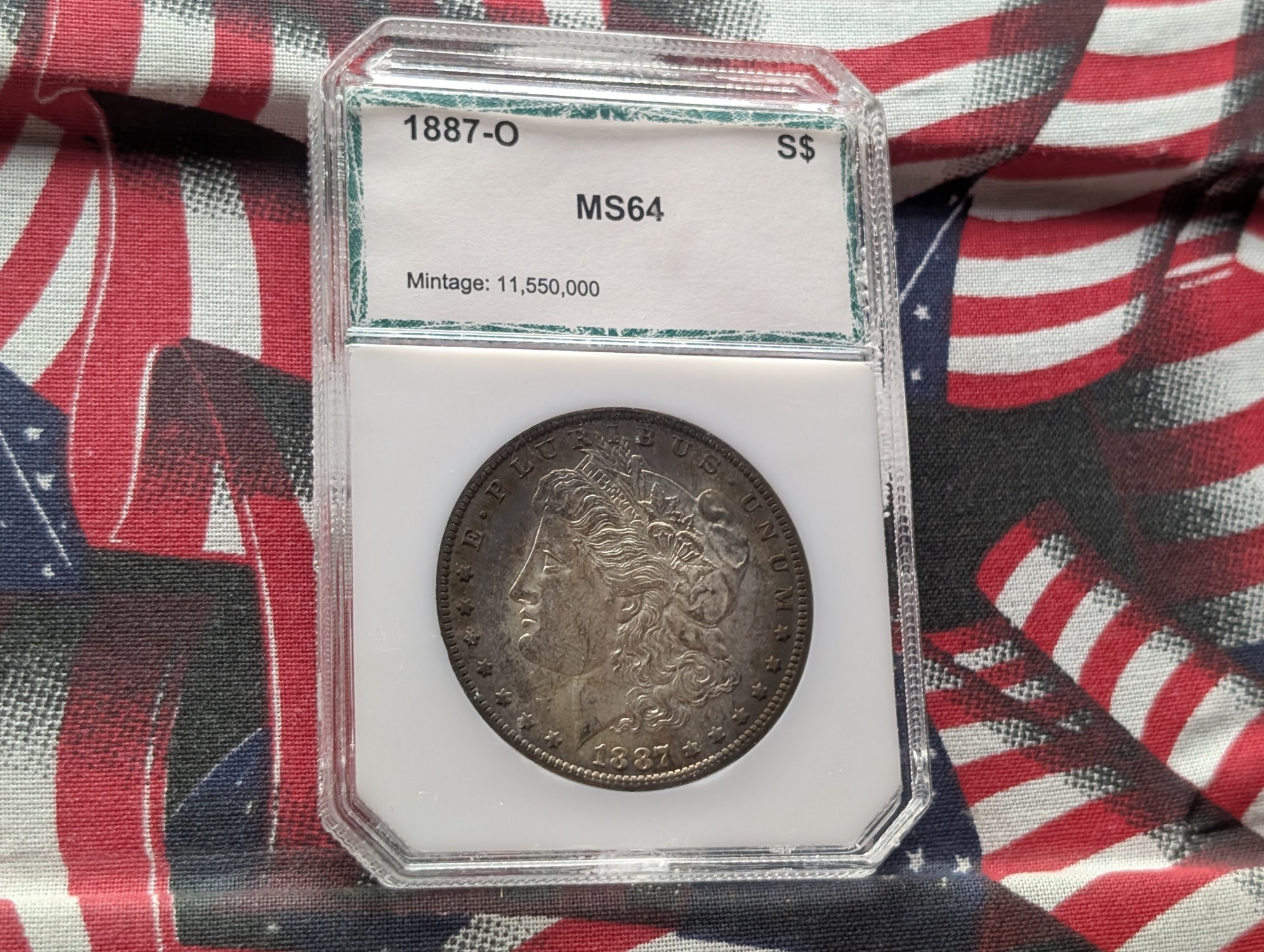 1887-O Morgan 90% Silver Dollar w/ Toning PCI Cert. MS64