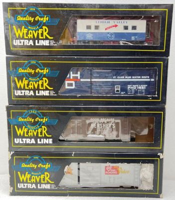 Modern Era Weaver O gauge freight cars in original boxes four trains total, C8 lightly run. 