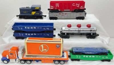 Modern Era Lionel O gauge group of loose freight semi tractor and trailer 18410 tank car in 