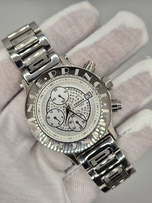 שעון של חברת Prince לנשים במצב טוב מאוד, כרונוגרף עם לוח בצבע לבן פנינה כולל קריסטלים פנימיים. 