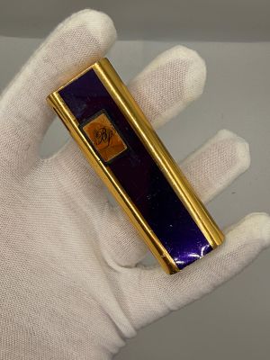 סט של שני מצתים וינטג מאספן גדול בתחום, אחד מוזהב של חברת Dunhill ככל הנראה גם כן בייצור 