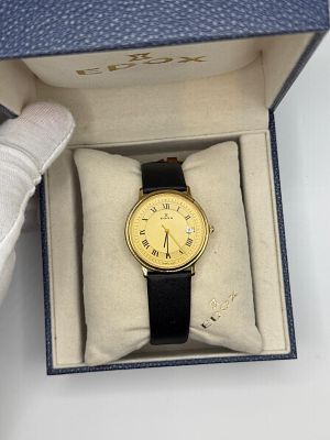 שעון יפה מאוד Vintage של חברת Edox עם רצועת עור חומה, גוף זהב ולוח בצבע זהב עם אינדקסים הכוללים 