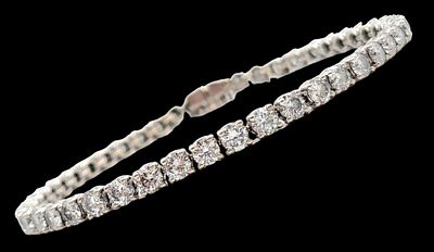 יוקרתי ואיכותי ביותר! צמיד טניס זהב לבן 18K איכותי!, משובץ 46 יהלומים טבעיים במשקל כולל 6.9CT 