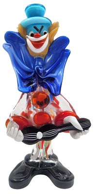 ליצן זכוכית מורנו איטליה, מנגן בגיטרה, גובה 25 ס"מ. 
פריט שביר או בגודל ו/או במשקל חריג, אריזה 