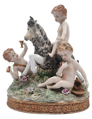 קבוצת פיסול שלושה ילדים ועז פסל פורצלן בסגנון "מייסן", חתום, גובה 25 ס"מ. 
פריט שביר או בגודל 