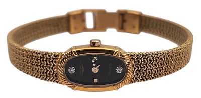 שעון יד LONGINES, שוויץ, מוזהב, במצב עבודה, בקופסה המקורית, קוטר 15 ס"מ. 
"בית המכירות אינו 