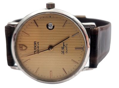 שעון יד TUDOR שוויץ, במצב עבודה, בקופסה המקורית, כולל תעודת מקוריות, קוטר 30 מ"מ. 
"בית המכירות 