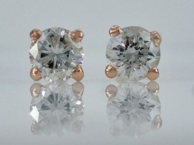 A pair of ROSE GOLD 14K gold and pink earrings, a classic martini model set with natural 