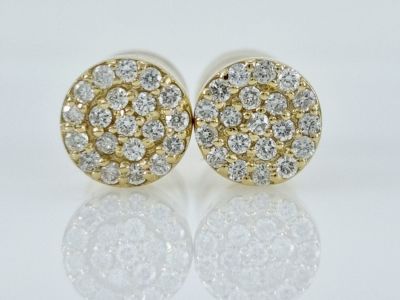 14K gold earrings set with completely natural diamonds with a total weight of 0.25 carats in 