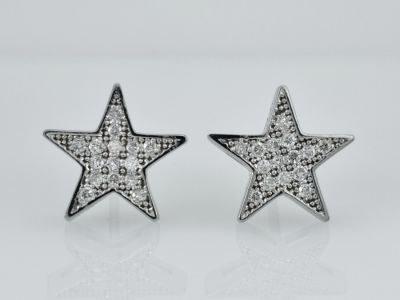 A pair of 14K white gold earrings, a stunning star-shaped model set with completely natural 