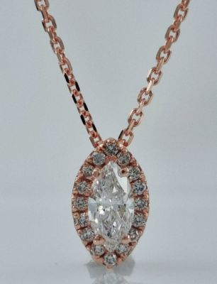 Rose Gold 14K Gold Chain Pendant inlaid with diamonds, a center stone weighing 0.3 carats 