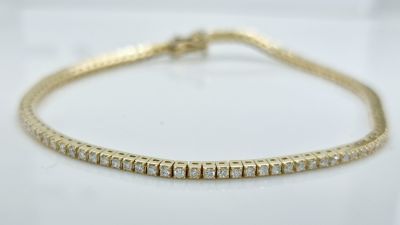 צמיד טניס זהב צהוב 14K משובץ יהלומים במשקל 1 קראט בניקיון VS צבע D/F אורך 17 ס"מ משקל זהב 6 גרם