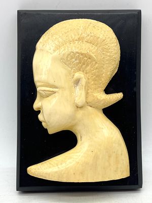 Vintage African Female Bust carved in ivory on a rectangular dark wood base.