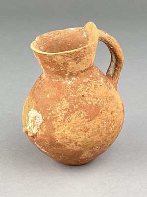 Ancient Holy Land Red Terracotta Juglet. Ancient Holy Land red terracotta juglet, with a 