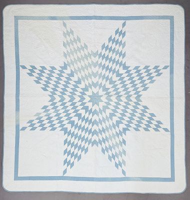 American Star Quilt 19th Century. Antique American hand stitched quilt, in a "Star" pattern 