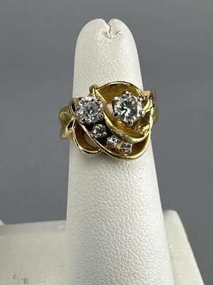 14K Yellow Gold Ladies 5 Diamond Ring. Marked 14K DD on shank. Ring size is 4 with sizing balls 