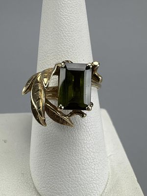 14K Ladies Emerald Cut Green Tourmaline Leaf Ring. Tests14K, size 8 3/4+, and weighs approx. 7.4 