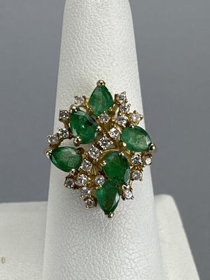 14K YG Ladies Emerald & Diamond Cocktail Ring. Marked 14K 585. 22 round diamonds and 6 pear 