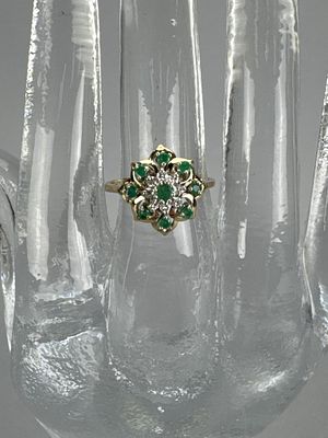 14K Yellow Gold Emerald and Diamond Cluster Ring. Yellow gold ring with 9 emeralds and 8 