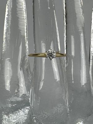14K Yellow Gold 0.33 Carat Diamond Solitaire Ring. Ring is marked 14K, size 8 1/2, and weighs 