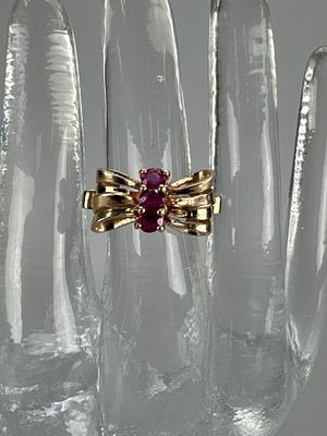14K Rose Gold 3 Ruby Ribbon Bow Ring. Ring is marked 14K, size 6, and weighs approx. 4.4 grams.