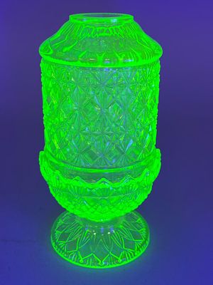 Wilkerson Green Vaseline Glass Fairy Lamp. Two-piece green Vaseline glass fairy lamp with an 