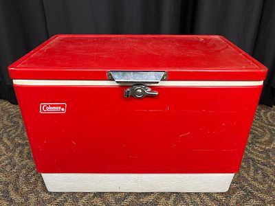 Coleman Red and White Cooler With Metal Hinges. Coleman-brand hard-sided cooler in red and 