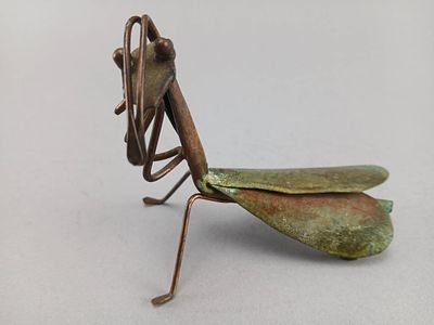 Copper and Brass Praying Mantis Sculpture. Figurative sculpture of a praying mantis constructed 