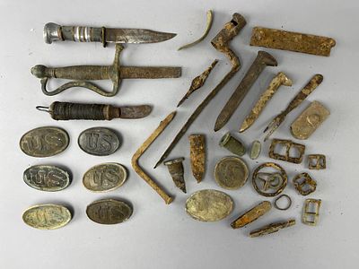 Rusty Knives, Tools, & Belt Buckles Collection. Lot includes a collection of rusted knives 