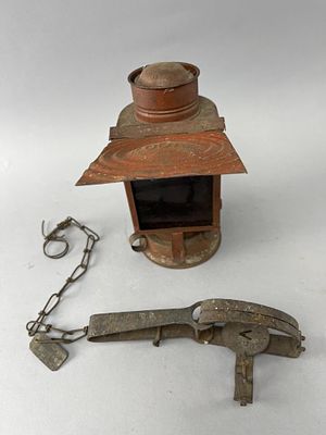 Kodak Lantern & Game Trap. Early 20th-century Kodak lantern constructed of metal with a red 