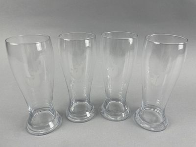 Set of 4 QDMA Beer Glasses. Set of four QDMA-branded tall beer glasses, featuring etched deer 