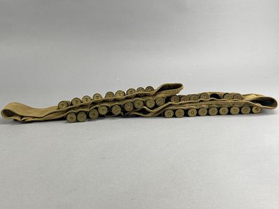 33x 12ga Shotgun Shells w/ 2 Bandoliers. Two bandoliers containing a total of 33 12-gauge 