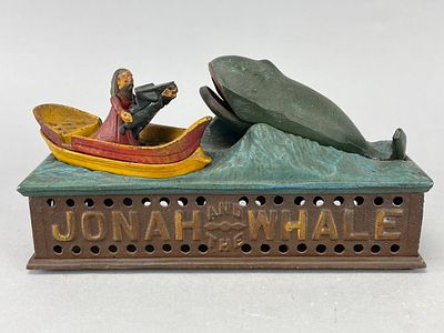 Jonah and the Whale Cast Iron Mechanical Bank. This is a cast iron mechanical bank depicting 