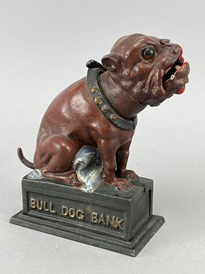 Cast Iron Bull Dog Bank, 7 Inches Tall. Cast iron mechanical bank depicting a bull dog seated on 