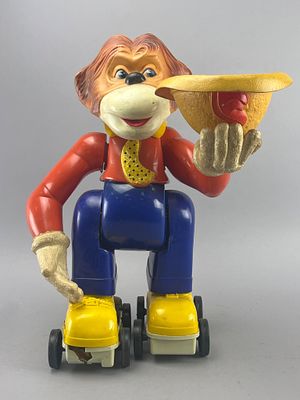 Clancy The Great Roller-Skating Monkey Toy. Clancy the Great roller-skating monkey toy, made of 
